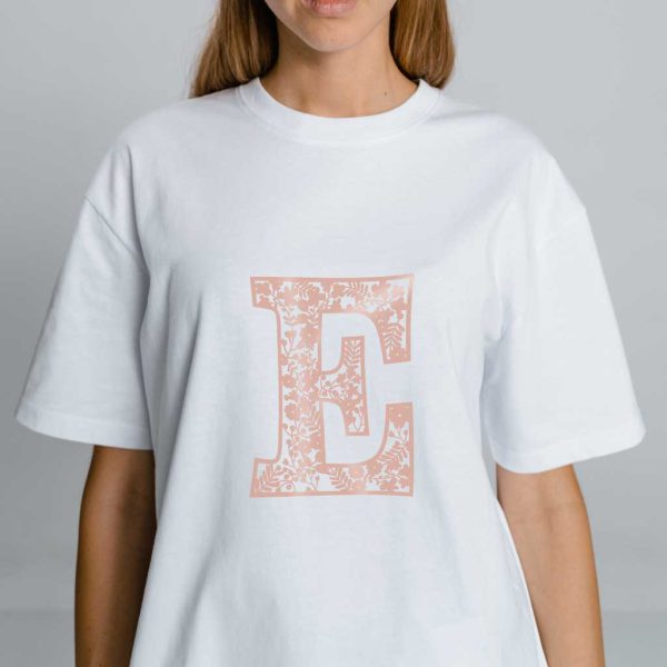 Floral alpabet letter E on a plain white t-shirt