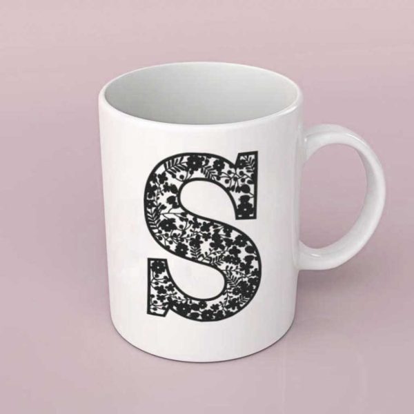 Floral alphabet letter S on plain white mug